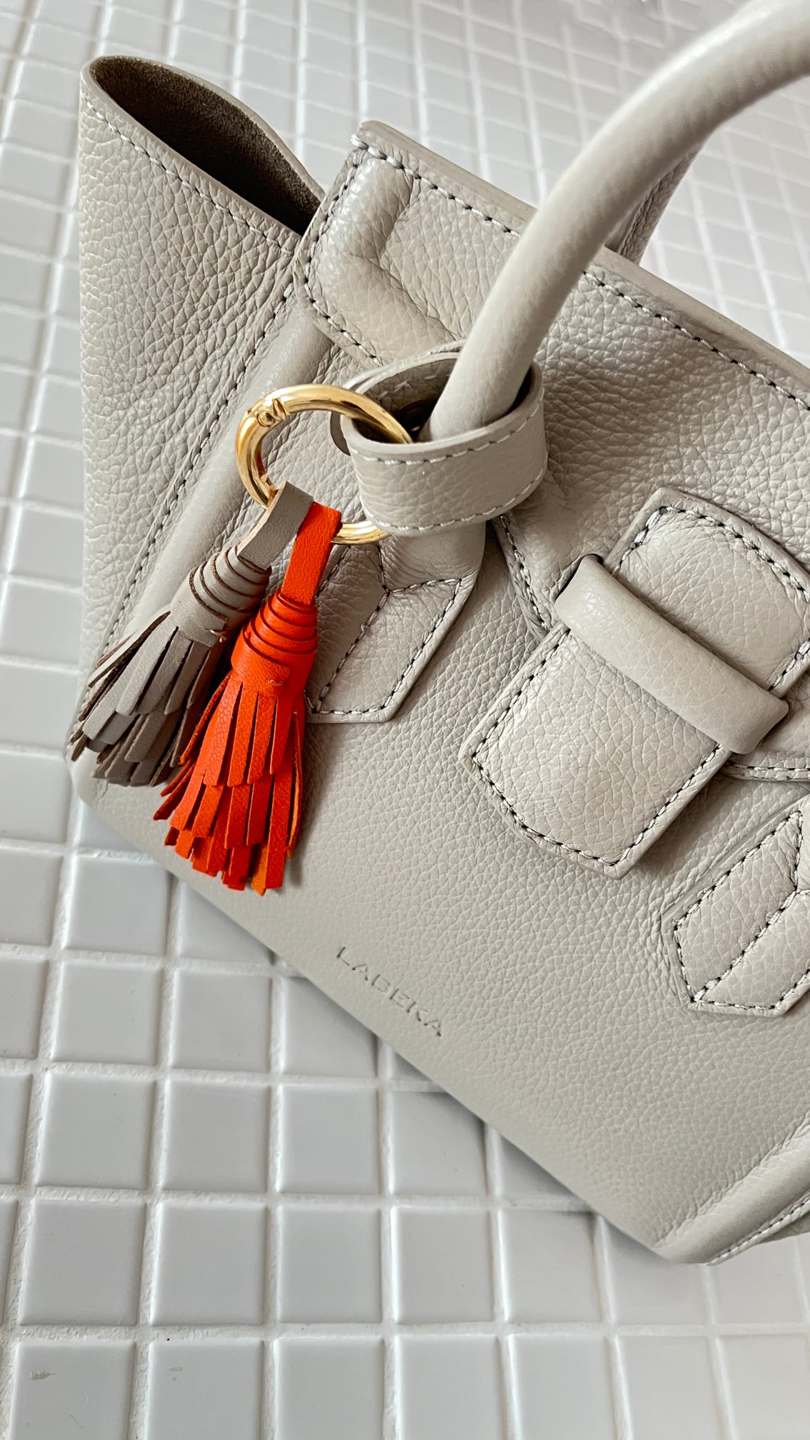 Petit Taupe Leather Tassel